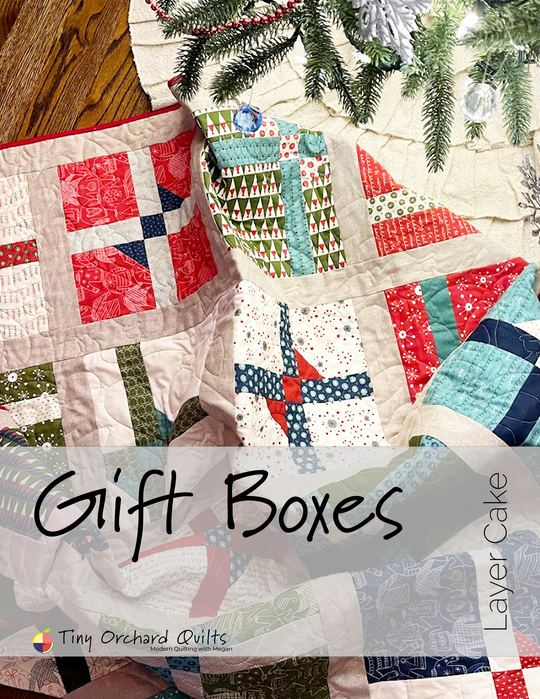 "Gift Boxes Layer Cake Quilt” is a Free Christmas Lap Quilt Pattern designed by & from Tiny Orchard Quilts!